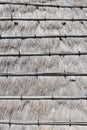 Closeup of thatched roof house or hay dry grass with bamboo for texture background Royalty Free Stock Photo