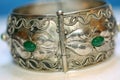 Closeup of a thick filigree silver bracelet with malachite Royalty Free Stock Photo