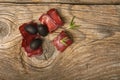 Closeup of thin slices of prosciutto with olives