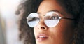 Closeup of thinking businesswoman wearing vision optometry glasses and looking confident, assertive and ready for Royalty Free Stock Photo