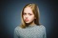 Closeup Thoughtful girl with Hand at head isolated on Gray