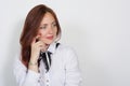 Closeup of a thoughtful red-haired woman looking away isolated Royalty Free Stock Photo