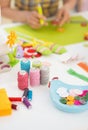 Closeup on threads and buttons on table