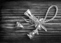 Closeup three Christmas new year bells lying on an old wooden