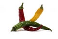 Closeup three colored chili peppers white background Royalty Free Stock Photo
