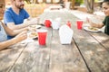 Eating food outdoors with friends Royalty Free Stock Photo