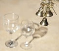 Closeup three golden Christmas bells hanging on the blurred back Royalty Free Stock Photo