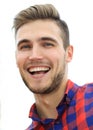 Closeup of three young people smiling on white background Royalty Free Stock Photo