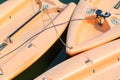 Closeup of three moored sailing dinghies