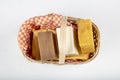 Closeup of three of natural handmade soaps. Coffee, Goat milk, Saffron and scrub soaps