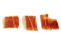 Closeup of three serrano ham slices isolated on Royalty Free Stock Photo