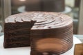 Closeup of a three-tier chocolate cake