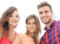 Closeup of three young people smiling on white background Royalty Free Stock Photo