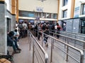 Closeup of Ticket Counter and people queue in a Kengeri Railway Station