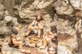 Closeup of tiny model cavemen figurines