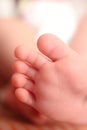 Closeup Of Tiny Newborn Baby`s feet