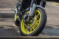 Closeup tire and dish bake of street motorcycle - image