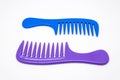 Closeup to Blue and Purple Plastic Comb, Isolated