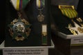 Closeup to a colombian police medals into a showcase