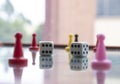 Closeup to a double six old dices with color pawns over a Colombian native board game Royalty Free Stock Photo