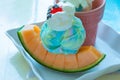 Closeup to Fresh Melon with Rainbow Ice Cream