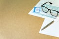 Closeup to Individual Income Tax Return Form 1040, social security card of USA,  glasses, ruler and pen located on the table with Royalty Free Stock Photo