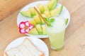 Milk melon Smoothie in glass with Roast bread