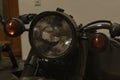 Closeup to a vintage motorcycle front lights