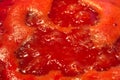 Closeup of tomato sauce boiling and reducing down Royalty Free Stock Photo