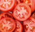 Closeup tomatoes sliced in half Royalty Free Stock Photo
