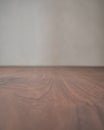 Closeup toned black walnut surface with white wall on background Royalty Free Stock Photo
