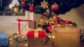 Closeup toned image of colorful gifts and presents in boxes under Christmas tree at living room Royalty Free Stock Photo