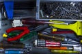Closeup tools various in opened toolbox. View from above