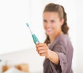 Closeup on toothbrush in hand of young woman Royalty Free Stock Photo