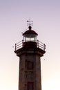 Closeup of the Top of a Lighthouse against sky