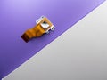 Closeup top view of a digital camera sensor on a purple background with a copy space Royalty Free Stock Photo