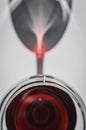 Closeup top view of a glass of red wine with shadows and reflections Royalty Free Stock Photo