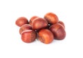 Closeup top view horse chestnuts isolated on white background, healthy food concept