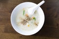 Closeup top view mush or boiled rice in white bowl, morning breakfast Royalty Free Stock Photo