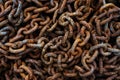 Closeup top view of old rusty chains pile Royalty Free Stock Photo