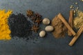 Closeup and top view of various of spices on the dark table Royalty Free Stock Photo