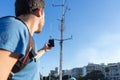closeup Tourist With No Cellphone data Or Network. Man holding mobile telephone and searching for signal internet connection. Royalty Free Stock Photo