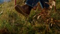 Closeup tourist shoes going mountains on hiking trail. Man legs trekking nature. Royalty Free Stock Photo