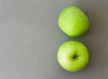 Closeup tov view green fresh apples fruit on grey background , h Royalty Free Stock Photo