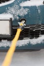 Closeup of towed car with towing rope