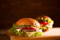 closeup of traditional cheeseburger or hamburger and french fries Royalty Free Stock Photo