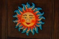 04.18.2014 Italy, Sicily, Erice. Colorful ceramic sun face souvenir Royalty Free Stock Photo