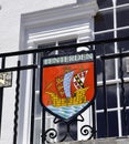 Closeup of the traditional Tenterden town coat arms sign