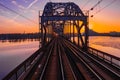 Closeup of train bridge over Daugava river in Riga, Latvia during a breathtaking sunset Royalty Free Stock Photo