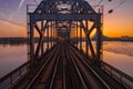 Closeup of train bridge over Daugava river in Riga, Latvia during a breathtaking sunset Royalty Free Stock Photo
